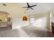 Living room with vaulted ceiling, fireplace and view to kitchen at 3869 Merryweather Trl, Austell, GA 30106