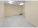 Unfinished basement area with concrete floor and ample space at 3869 Merryweather Trl, Austell, GA 30106