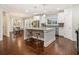 Modern kitchen with island, stainless steel appliances, and hardwood floors at 1396 Sugarmill Oaks Ave, Atlanta, GA 30316