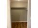 Empty closet with wood flooring and a single shelf at 172 Rue Fontaine, Lithonia, GA 30038