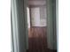 Hallway with hardwood floors and access to other rooms at 172 Rue Fontaine, Lithonia, GA 30038