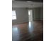Spacious living room with hardwood floors and an open floor plan at 172 Rue Fontaine, Lithonia, GA 30038
