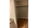 Spacious closet with wood flooring and shelving for storage at 172 Rue Fontaine, Lithonia, GA 30038