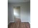 Cozy bedroom with hardwood floors and ample closet space at 172 Rue Fontaine, Lithonia, GA 30038
