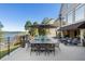 Enjoy alfresco dining by the pool with lake views at 6308 Woodlake Dr, Buford, GA 30518