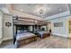 bunk room with two sets of built-in bunks, a nautical theme, and wood flooring at 6308 Woodlake Dr, Buford, GA 30518