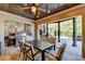 Outdoor kitchen with built-in grill and stone feature wall at 6308 Woodlake Dr, Buford, GA 30518