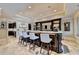Custom-built bar with granite countertops and seating for four at 6308 Woodlake Dr, Buford, GA 30518