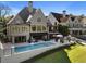 Luxury home with large pool and lakefront views at 6308 Woodlake Dr, Buford, GA 30518