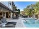 Stunning pool and patio area with plenty of space for lounging at 6308 Woodlake Dr, Buford, GA 30518