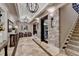 Elegant lower level with stone accent wall and sitting area at 6308 Woodlake Dr, Buford, GA 30518