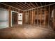 Unfinished interior with exposed framing and walls at 418 N Highland Ne Ave, Atlanta, GA 30307