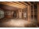 Unfinished interior with exposed beams and walls at 418 N Highland Ne Ave, Atlanta, GA 30307