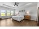 Spacious primary bedroom with hardwood floors and large windows at 3445 Andover St, Cumming, GA 30028