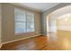 Formal dining room featuring hardwood floors and a chandelier at 1712 Country Wood Dr, Hoschton, GA 30548