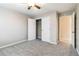 Bright bedroom with ceiling fan, neutral walls and carpet at 1712 Country Wood Dr, Hoschton, GA 30548
