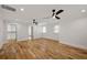 Large bedroom with hardwood floors, two ceiling fans, and walk-in closet at 865 Mcdaniel Sw St, Atlanta, GA 30310