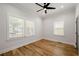 Bright bedroom with hardwood floors, neutral walls, and ceiling fan at 865 Mcdaniel Sw St, Atlanta, GA 30310