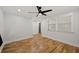 Light-filled bedroom with hardwood floors and ceiling fan at 865 Mcdaniel Sw St, Atlanta, GA 30310