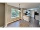 Dining area with hardwood floors and kitchen view at 4015 Soaring Dr, Douglasville, GA 30135