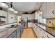 Spacious kitchen featuring granite countertops, stainless steel appliances, and ample cabinetry at 1719 Cat Tail Ct, Lawrenceville, GA 30044