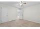 Bright bedroom with ceiling fan and access to another room at 3589 Orchard Cir, Decatur, GA 30032