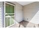 Inviting front porch with green door and screen door at 3589 Orchard Cir, Decatur, GA 30032