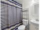 Clean bathroom with shower/tub combo, and updated vanity at 3589 Orchard Cir, Decatur, GA 30032