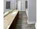 Bathroom with granite double vanity and tile flooring at 1002 Cumberland Se Ct, Smyrna, GA 30080