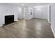 Spacious living room with fireplace and hardwood floors at 1002 Cumberland Se Ct, Smyrna, GA 30080