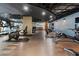 Modern fitness center with various exercise equipment and inspirational quote at 361 17Th Nw St # 1001, Atlanta, GA 30363