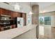 Granite countertop kitchen island with breakfast bar seating at 361 17Th Nw St # 1001, Atlanta, GA 30363