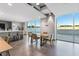 Bright and spacious common area with seating, a table, and large windows at 361 17Th Nw St # 1001, Atlanta, GA 30363