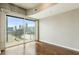 Bright living room with hardwood floors and city views at 361 17Th Nw St # 1001, Atlanta, GA 30363
