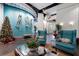 Elegant lobby with comfortable seating, plants, and unique artwork at 361 17Th Nw St # 1001, Atlanta, GA 30363