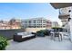 Private patio with outdoor furniture and city views at 361 17Th Nw St # 1001, Atlanta, GA 30363