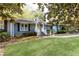 Cute blue house with yellow door and white railing at 1760 Barnesdale Ne Way, Atlanta, GA 30309