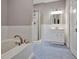 Bathroom with a shower, bathtub, and updated vanity at 1825 Center Ave, Atlanta, GA 30344