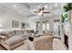 Spacious living room with hardwood floors, fireplace, and access to balcony at 3637 Habersham Nw Rd # 46, Atlanta, GA 30305