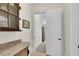 A hallway with granite countertop and access to other rooms at 3637 Habersham Nw Rd # 46, Atlanta, GA 30305
