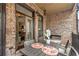 Brick patio with table and chairs, offering an outdoor dining space at 3637 Habersham Nw Rd # 46, Atlanta, GA 30305