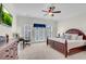 Spacious main bedroom with king-size bed, workspace, and private balcony access at 3637 Habersham Nw Rd # 46, Atlanta, GA 30305