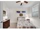 Bright bedroom with double bed, dresser, and window with blinds at 3637 Habersham Nw Rd # 46, Atlanta, GA 30305