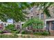 Three story brick townhouses with front yard landscaping at 3637 Habersham Nw Rd # 46, Atlanta, GA 30305