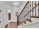 Elegant staircase with wrought iron railing and hardwood treads at 3637 Habersham Nw Rd # 46, Atlanta, GA 30305