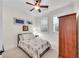 Cozy bedroom with ceiling fan and built-in wardrobe at 3637 Habersham Nw Rd # 46, Atlanta, GA 30305