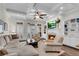 Cozy living room with fireplace, built-in shelving, and hardwood floors at 3637 Habersham Nw Rd # 46, Atlanta, GA 30305
