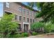 Brick townhomes with lush landscaping and mature trees at 3637 Habersham Nw Rd # 46, Atlanta, GA 30305