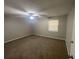 Spacious bedroom with neutral walls and plush carpeting at 3429 Tarragon Dr, Decatur, GA 30034