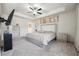 Main bedroom with a king-size bed, dresser and large TV at 47 S Auburn Landing Pl, Auburn, GA 30011